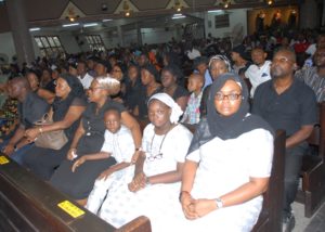 R-L: Wife of the Late Assistant Chief Public Relations Officer, Nigerian Civil Aviation Authority (NCAA), Obioma Hyacinth Njoku; Mrs. Obiageli Njoku, Daughter, Miss. Chidera Njoku and Son, Master Chimdealu Njoku; and others during Requiem Mass for the deceased, at the Catholic Church of the Ascension, Murtala Muhammed International Airport, Lagos.