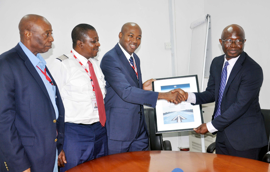 L-R: Manager, Flight Operations and Quality Assurance, Captain Olukayode Ola, Dana Air's Chief Pilot, Captain Jemitola Ayorinde, Accountable Manager/ Chief Operating Officer of Dana Air Obi Mbanuzuo and The Area Manager, South West IATA, Dr Samson Fatokun during the presentation of the International Air Transport Association's (IATA) membership certificate to Dana Air. 