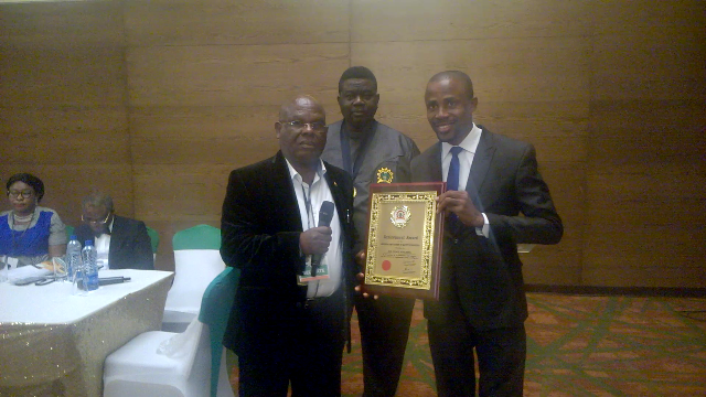 Corporate Communications Manager of Air Peace, Mr. Chris Iwarah (right) receiving the carrier’s safety award from the National Chairman of the Nigerian Institution of Safety Engineers (NISE), Mr. Adeyemi Oyedepo (2nd right) and a guest at NISE 2017 Conference/Annual General Meeting in Lagos on Thursday.