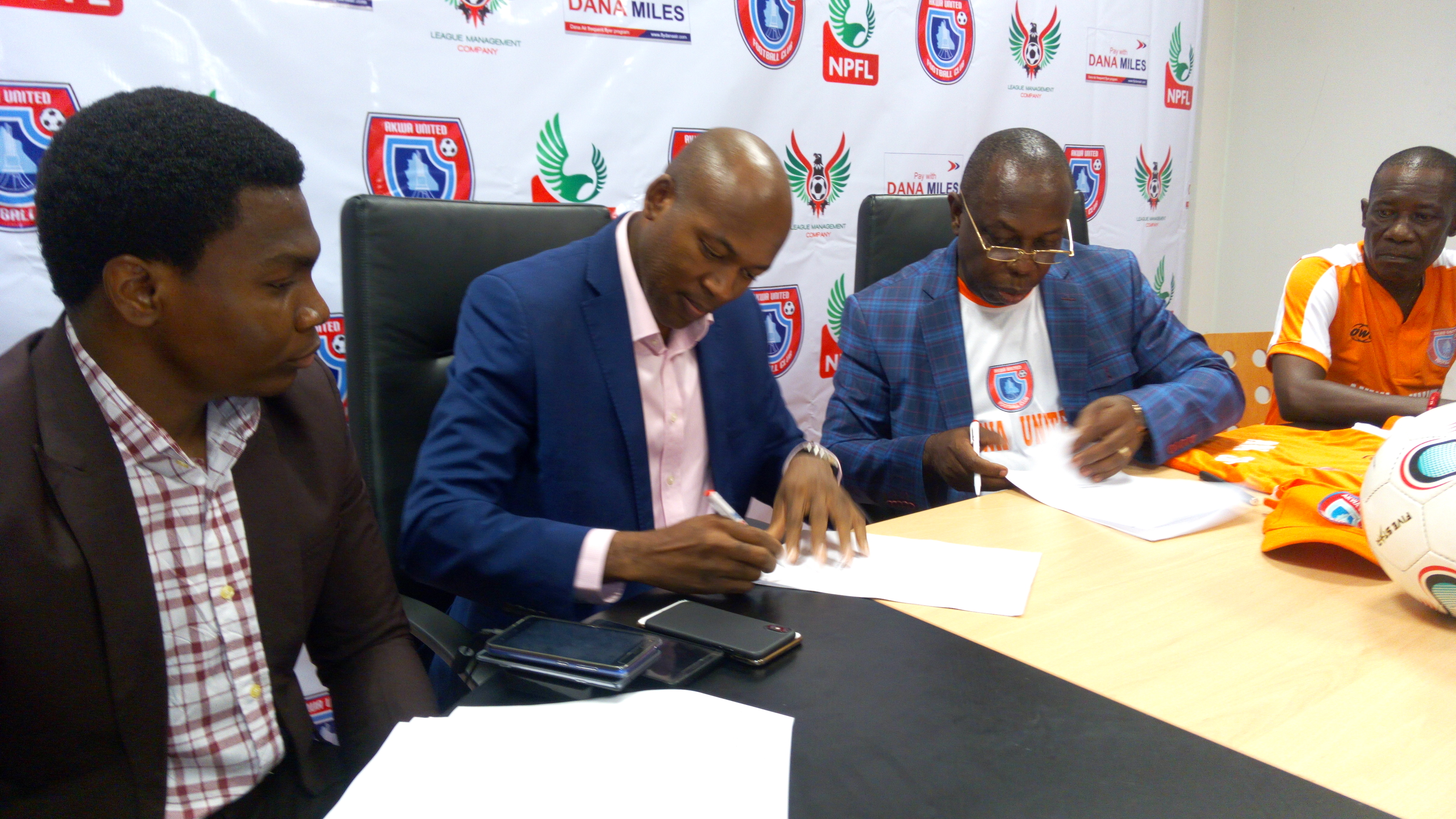 L-R Dana Air's Communications Manager, Kingsley Ezenwa, Chief Operating Officer/ Accountable Manager, Obi Mbanuzuo, Chairman of Akwa United fc, Elder Paul Bassey and Team Manager,  Udoh Emmanuel, during the signing of the sponsorship deal between Dana Air and Akwa United FC recently in Uyo, Akwa Ibom state. 